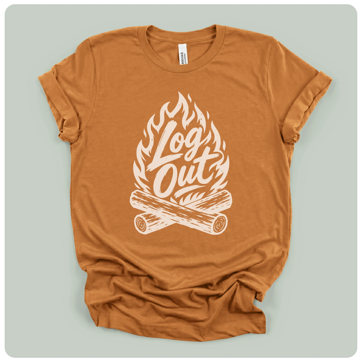 A rust-orange crewneck t-shirt with a white graphic print of a campfire and the words 'Log Out' in stylized lettering, laid flat on a light gray background.